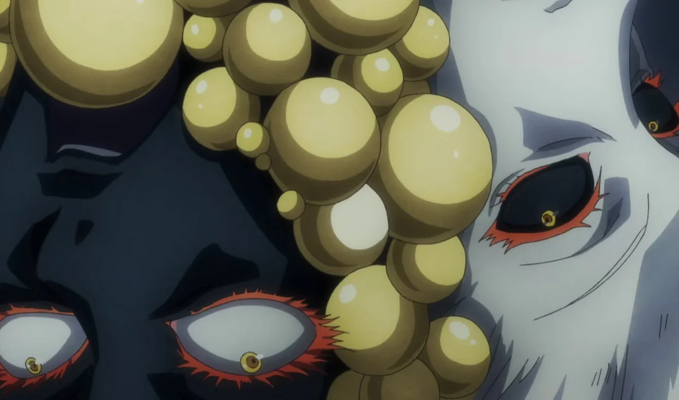 Primer plano del Kishikai conjunto de los Tensen en Jigokuraku mostrando los ojos y las protuberancias doradas