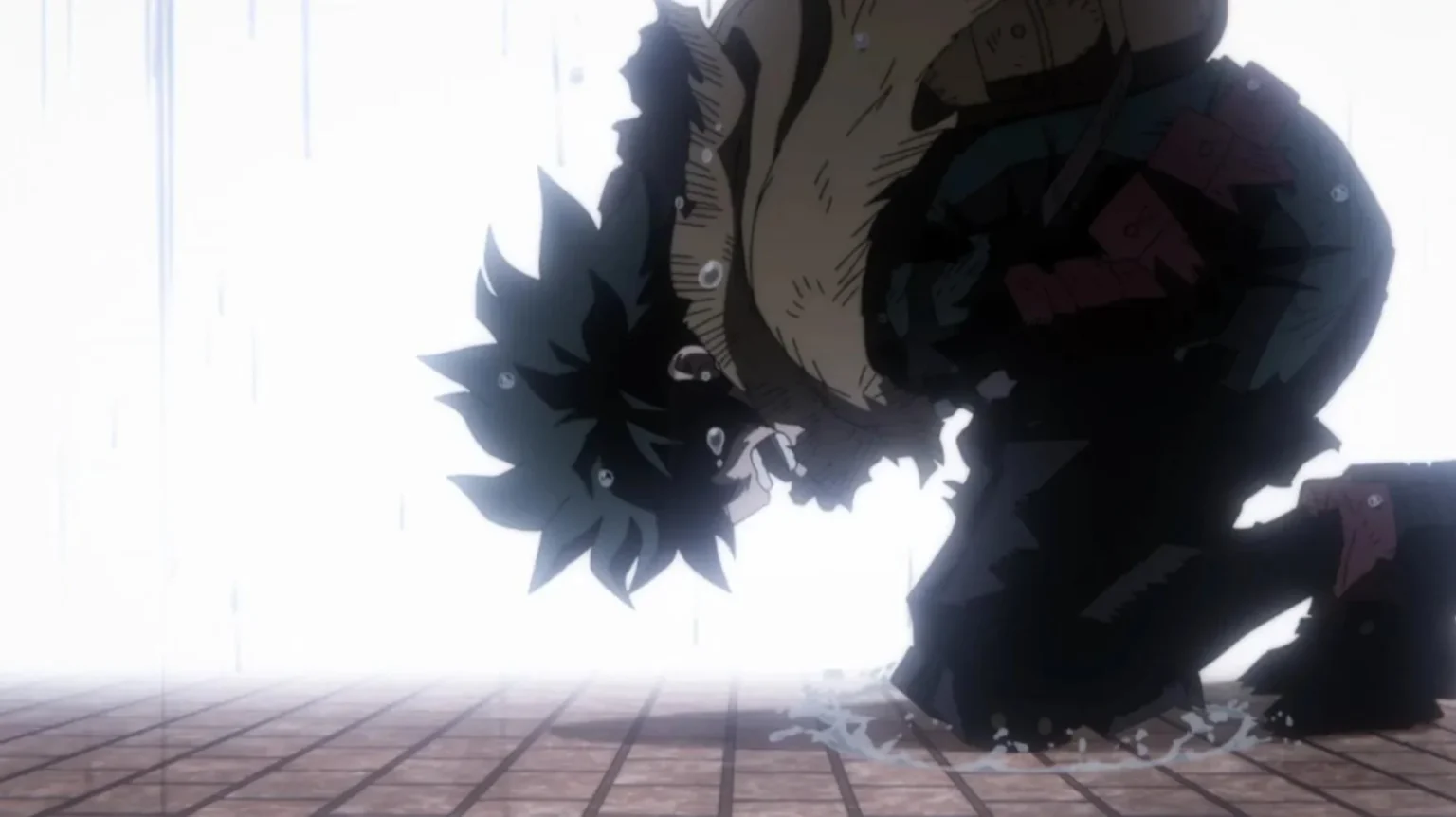 Deku en su etapa vigilante de My Hero Academia, arrodillado y destrozado bajo la lluvia en su momento de mayor quiebre emocional