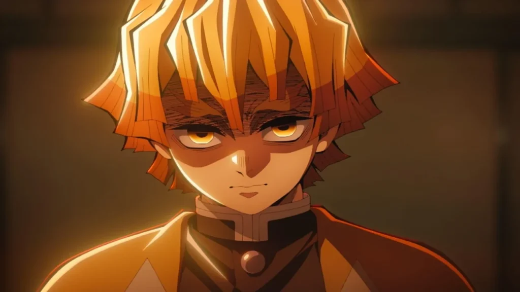 Zenitsu Agatsuma con mirada fija y expresión seria en Demon Slayer, lejos de su imagen de cobarde