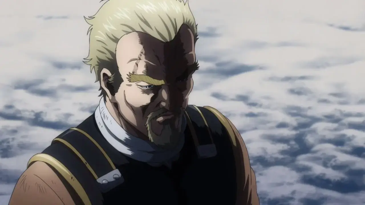 Askeladd, el icónico antagonista de Vinland Saga, con el rostro medio en sombras y una mirada profunda y seria