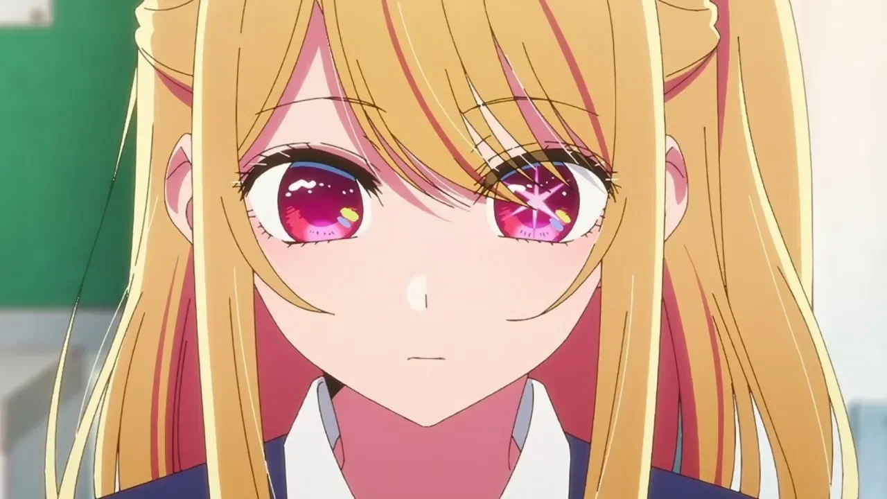 Ruby Hoshino mirando al frente con una estrella blanca brillante en su ojo izquierdo en el anime Oshi no Ko