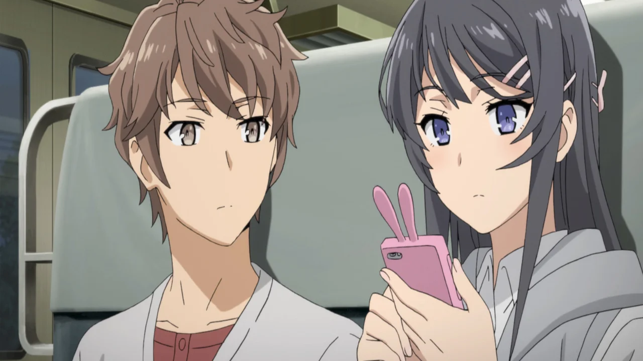 Sakuta Azusagawa y Mai Sakurajima juntos en el tren en Bunny Girl Senpai