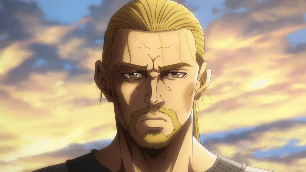 Primer plano de Thorfinn adulto con barba y cabello largo en la temporada 2 de Vinland Saga