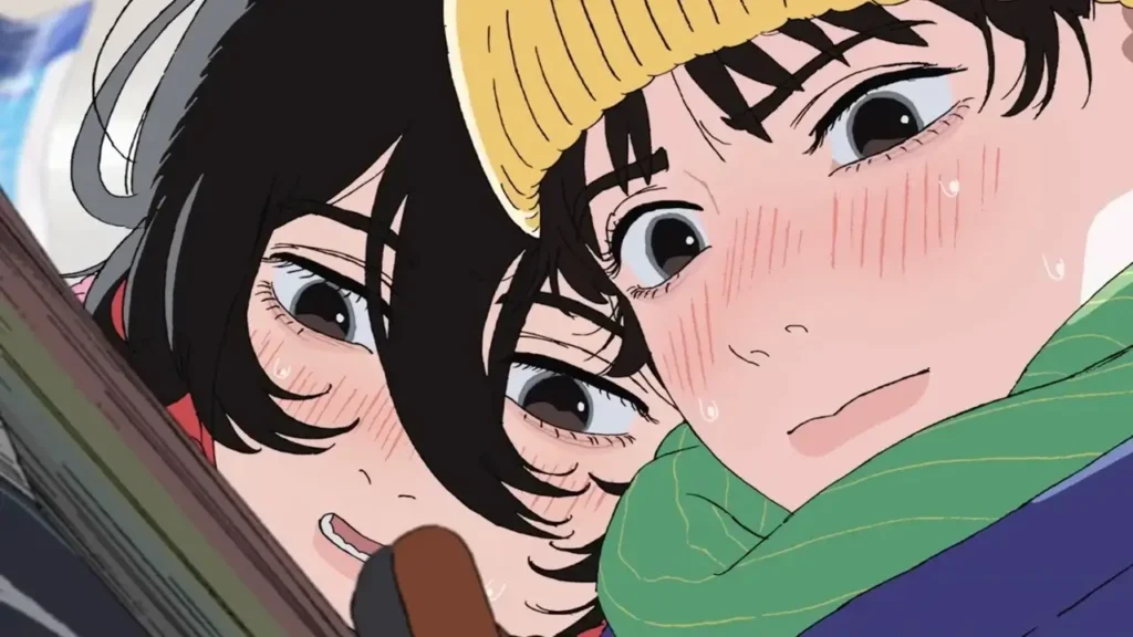 ujino y Kyomoto leyendo manga juntas en Look Back, con gorro amarillo y bufanda verde, en una escena de amistad y complicidad