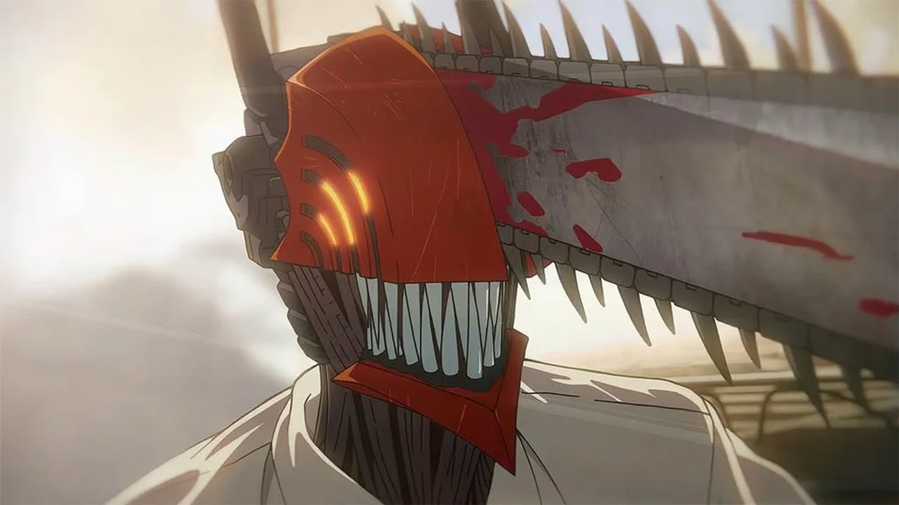 Primer plano de Denji como Chainsaw Man con su motosierra ensangrentada, protagonista del anime de MAPPA