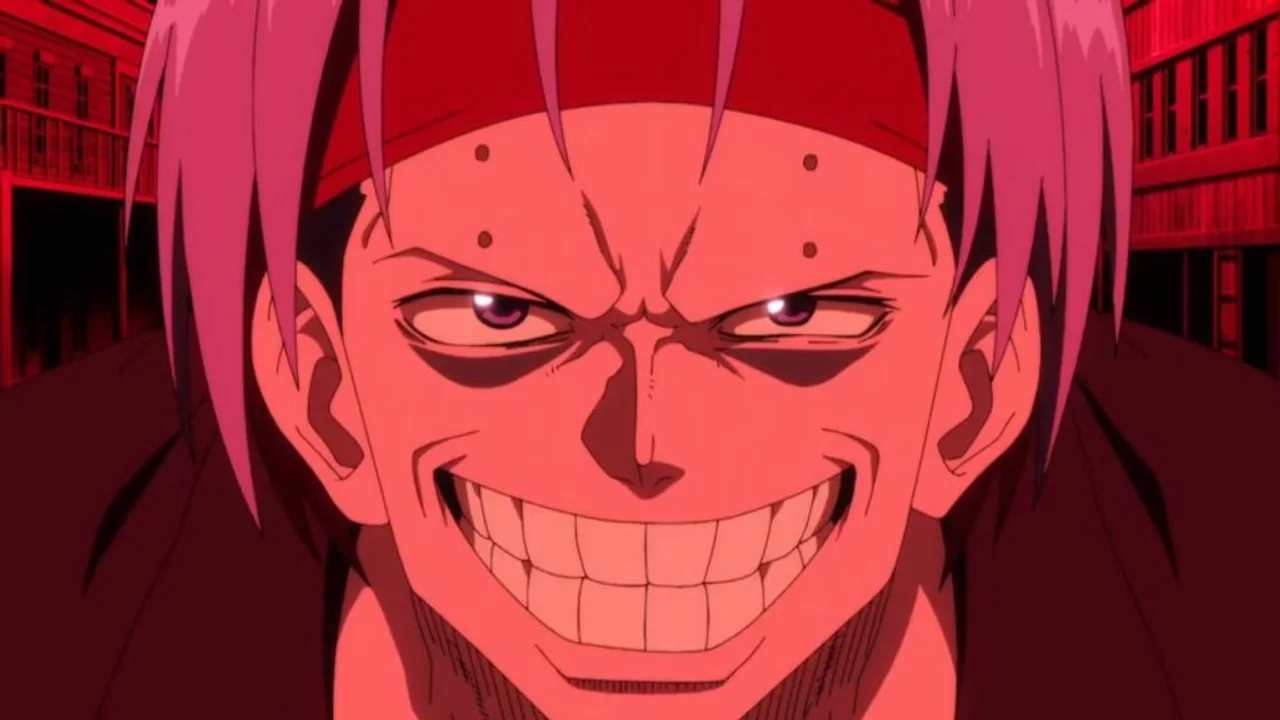 Nico Vorgeil sonriendo con luz roja en primer plano, personaje de Undead Unluck